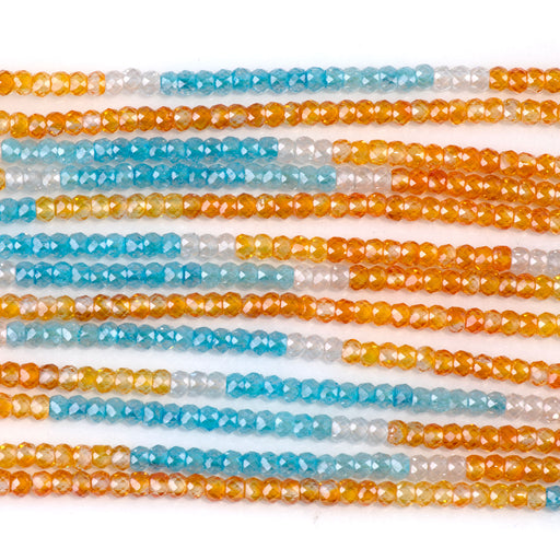 This is a Dakota Stones 2x3mm Cubic Zirconia Cz Orange Blue Gemstone strand with faceted rondelle beads in 15-16 inch strand.