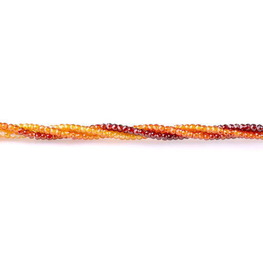 This is a Dakota Stones 2x3mm Zirconia Red Orange Banded Gemstone strand with faceted rondelle beads in 15-16 inch strand.