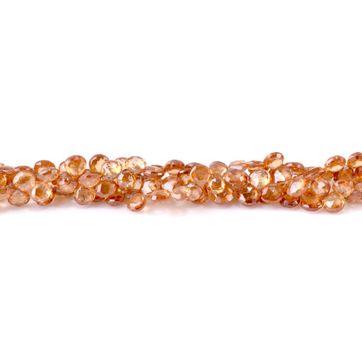 This is a Dakota Stones 5-6mm Zircon Brown Top Drill Gemstone strand with faceted drop beads in 8 inch strand.