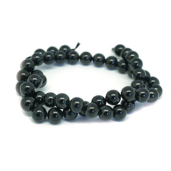 This is a Dakota Stones 8-9mm Black Spinel Gemstone strand with round beads in 15-16 inch strand.