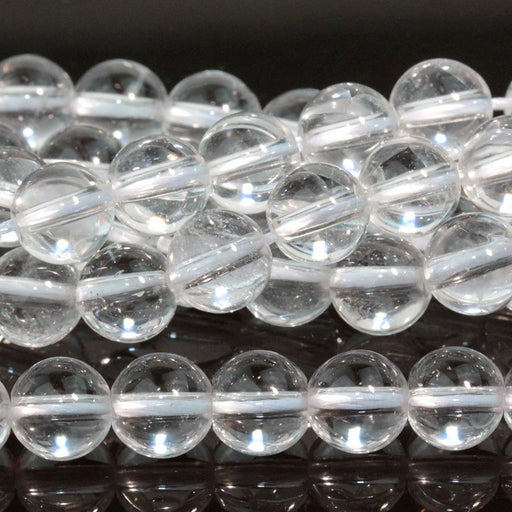 This is a Dakota Stones 6mm Crystal Quartz Gemstone strand with round beads in 15-16 inch strand.