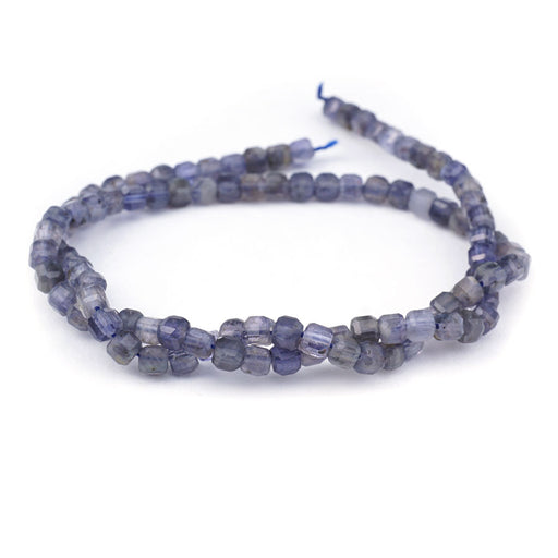 This is a Dakota Stones 4mm Iolite Gemstone strand with natural A grade table-cut cube beads in 15-16 inch strand.