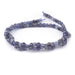 This is a Dakota Stones 4mm Iolite Gemstone strand with natural A grade table-cut cube beads in 15-16 inch strand.