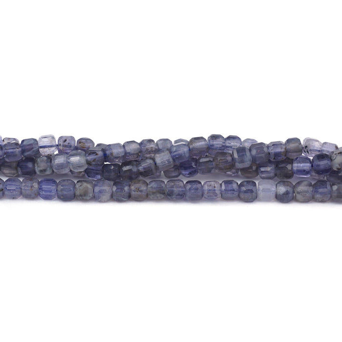 This is a Dakota Stones 4mm Iolite Gemstone strand with natural A grade table-cut cube beads in 15-16 inch strand.