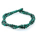 This is a Dakota Stones 4mm Malachite Gemstone strand with A grade table-cut cube beads in 15-16 inch strand.