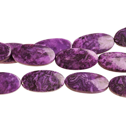 This is a Dakota Stones Purple Crazy Lace Agate Gemstone strand with oval beads in 8 inch strand.