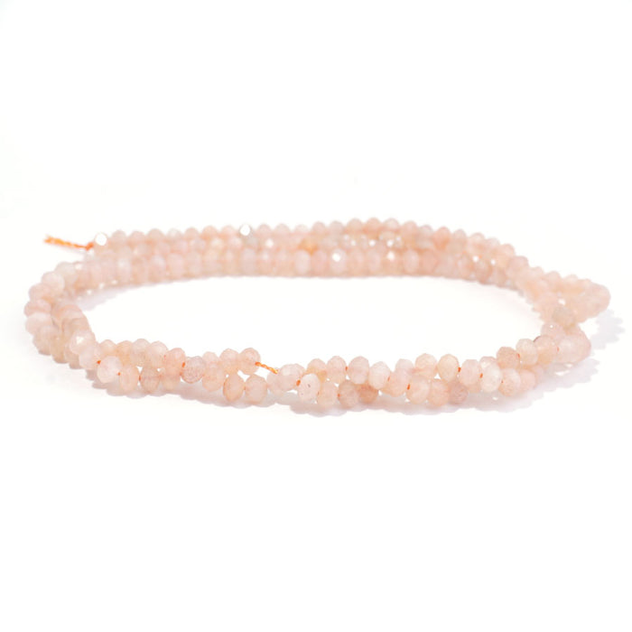 This is a Dakota Stones 3mm Peach Moonstone Gemstone strand with A grade faceted rondelle beads in 15-16 inch strand.