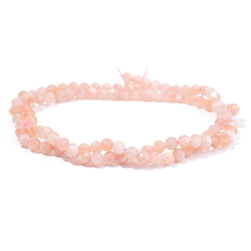 This is a Dakota Stones 4mm Peach Moonstone Gemstone strand with AA grade faceted round beads in 15-16 inch strand.