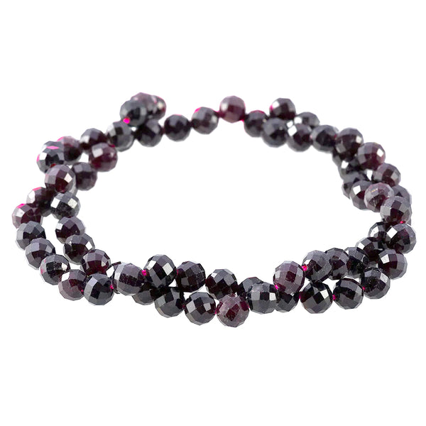 This is a Dakota Stones 6mm Red Garnet Gemstone strand with faceted round beads in 15-16 inch strand.