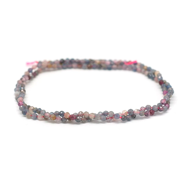 This is a Dakota Stones 2mm Ruby Sapphire Gemstone strand with faceted round beads in 15-16 inch strand.