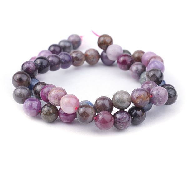 This is a Dakota Stones 8mm Ruby Sapphire Gemstone strand with natural round beads in 15-16 inch strand.