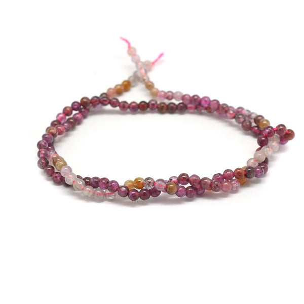 This is a Dakota Stones 2mm Ruby Banded Gemstone strand with round beads in 15-16 inch strand.