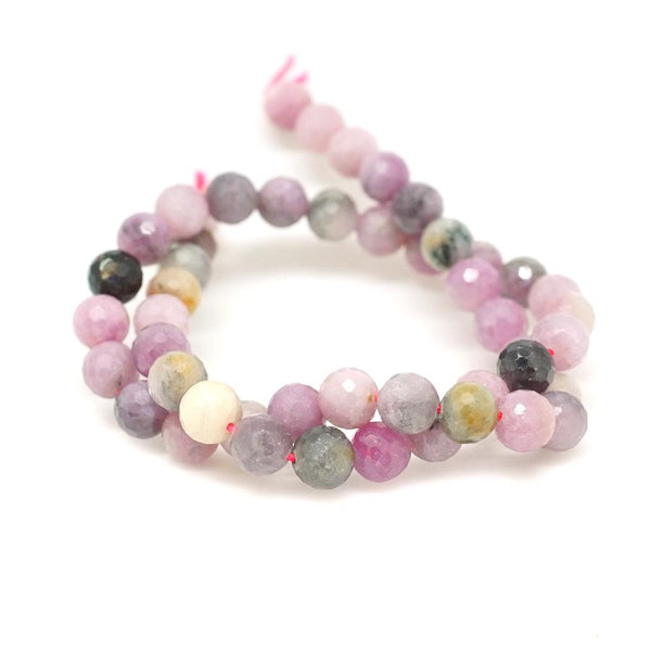 This is a Dakota Stones 8mm Ruby Diamond Cut Gemstone strand with round beads in 15-16 inch strand.