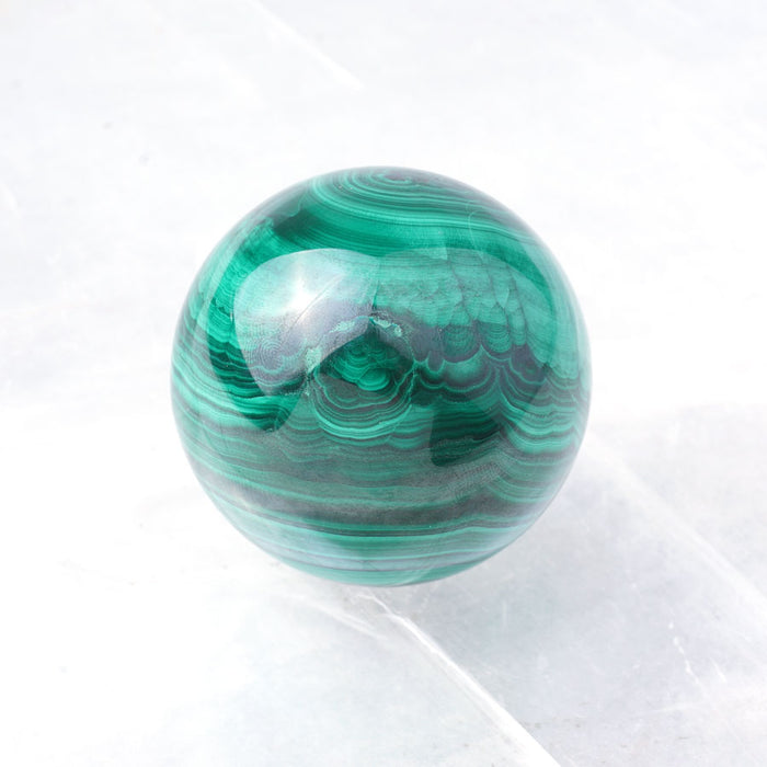 Malachite Sphere 50mm (180-200 grams) - DS ROCK SHOP