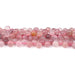 This is a Dakota Stones 6mm Strawberry Quartz Diamond Cut Gemstone strand with natural tear drop beads in 15-16 inch strand.