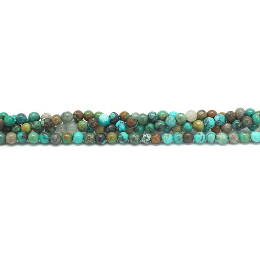 This is a Dakota Stones 3mm Grn Hubei Turquoise Green Gemstone strand with round beads in 15-16 inch strand.