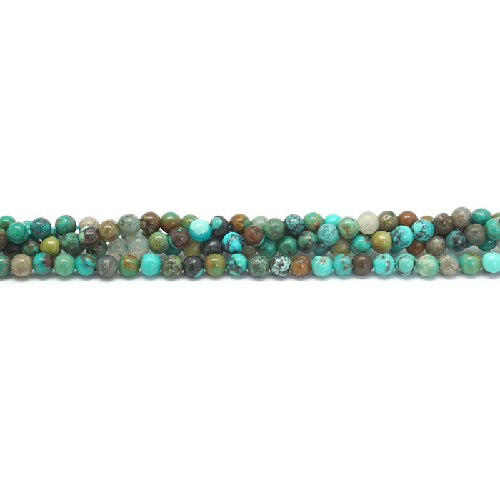 This is a Dakota Stones 3mm Grn Hubei Turquoise Green Gemstone strand with round beads in 15-16 inch strand.