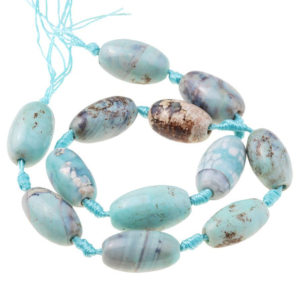 This is a Dakota Stones 15x20mm Terra Agate Gemstone strand with barrel beads in 15-16 inch strand.